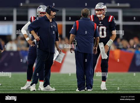 New England Patriots Head Coach Bill Belichick Talks With Mac Jones