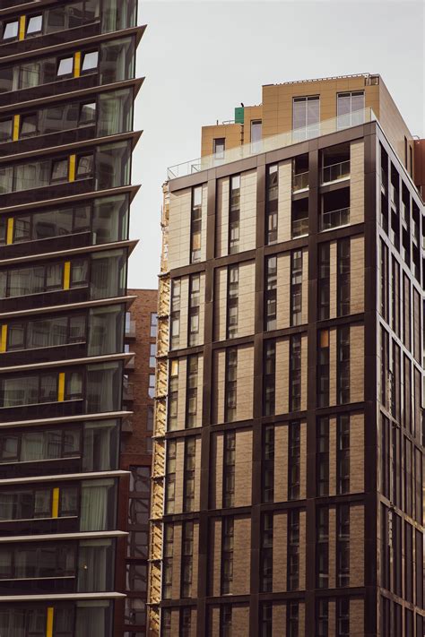 Grey And Blue Glass Bullet Tower · Free Stock Photo