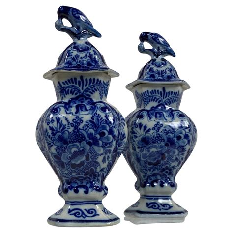 Pair Of Blue And White Dutch Delft Vases With Chinoiserie Scenes At Stdibs