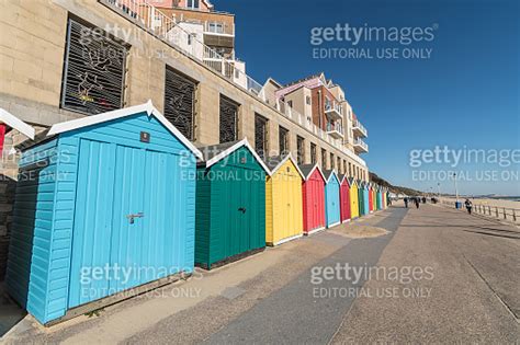 Colourful Beach Huts On Boscombe Seafront In Bournemouth