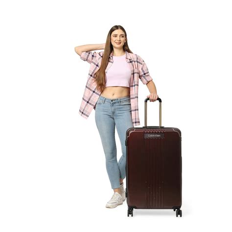 Buy Calvin Klein Reliant Brunette Precent Polycarbonate Material Hard Cabin Trolley Online