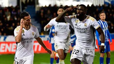 Ten-man Real Madrid score late to snatch victory at Alaves | Football ...