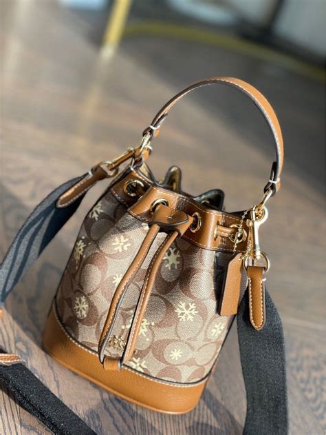 Coach Dempsey Drawstring Bucket Bag In Signature Canvas With