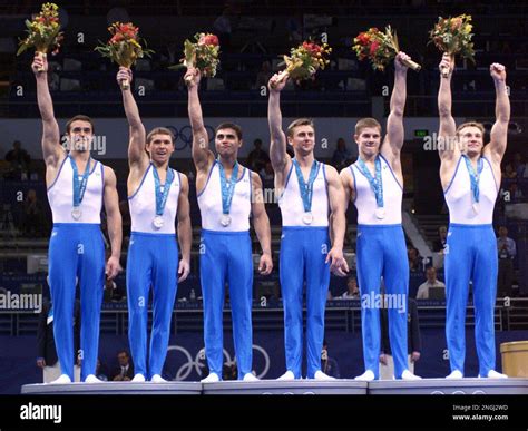 The Ukrainian Team Stands On The Podium After Recieving Their Silver Medals In The Men S