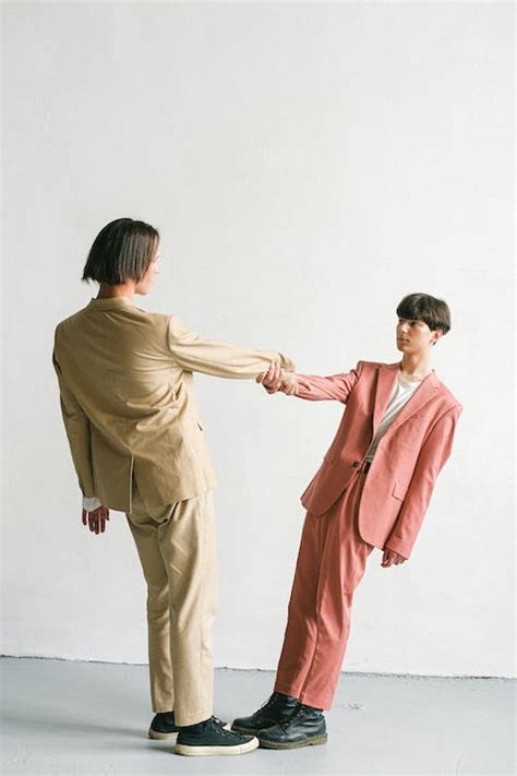 Men Holding their Hands · Free Stock Photo