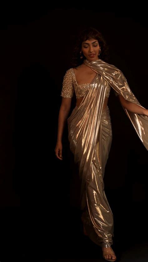 Metallic Gold Pre Pleated Saree In Lycra With An Embroidered Blouse