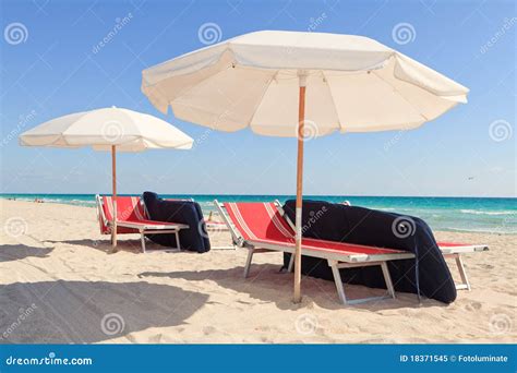 Colorful South Beach Umbrellas And Lounge Chairs Stock Image Image Of