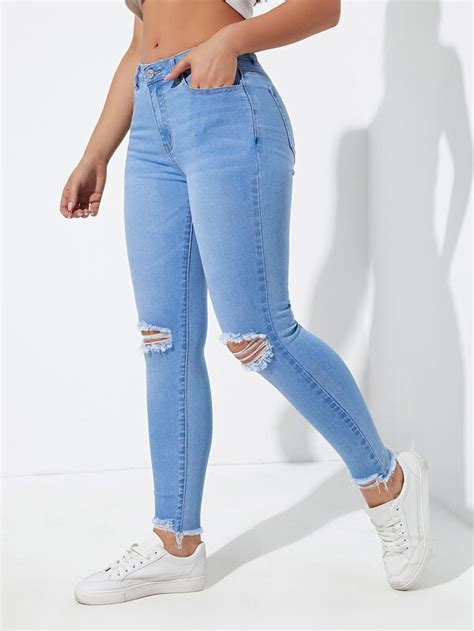 SHEIN Essnce Ripped Raw Cut Skinny Jeans SHEIN USA