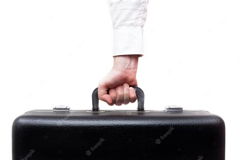 Premium Photo Man Carries A Heavy Suitcase