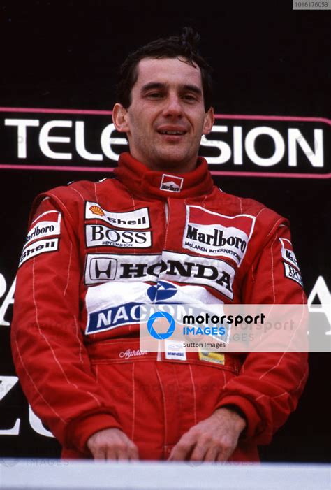 Ayrton Senna BRA McLaren Celebrates His Win On The Podium Formula