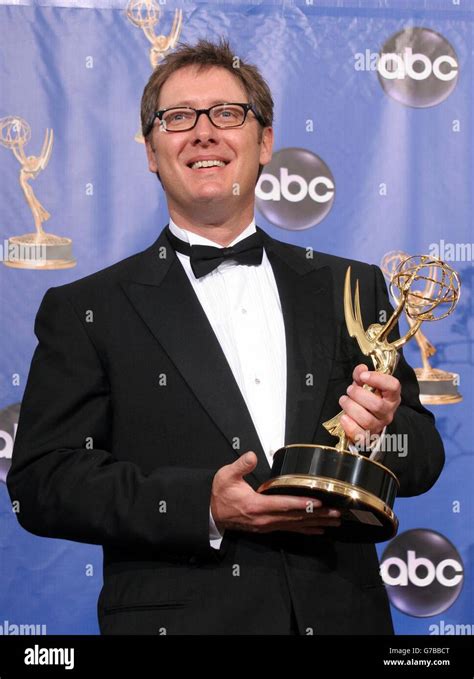 Actor James Spader holds the Emmy award he won as best lead actor in a drama series for his role ...