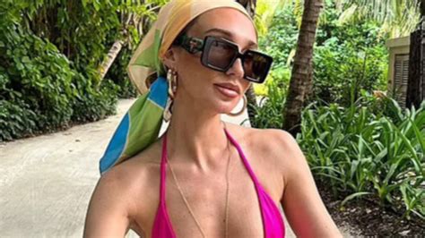 Megan Mckenna Flaunts Her Abs And Boobs In A Tiny Hot Pink Bikini While