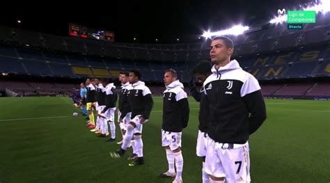 Messi and Ronaldo hug each other before the game