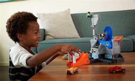 Hot Wheels City Zestaw Atak T Rexa Pojazdy tory i garaże Sklep