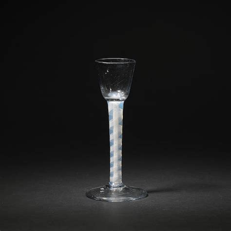 Bonhams An Unusual Opaque Twist Cordial Glass With An Opalescent Stem Circa 1765