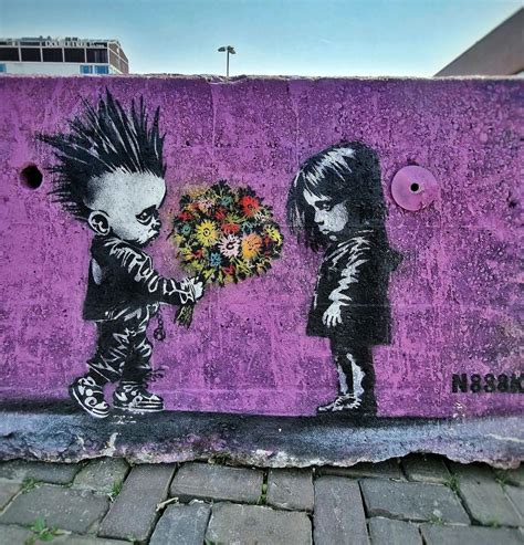 2 photos of the street art “Flowers for sad girl” by N888K in Amsterdam ...