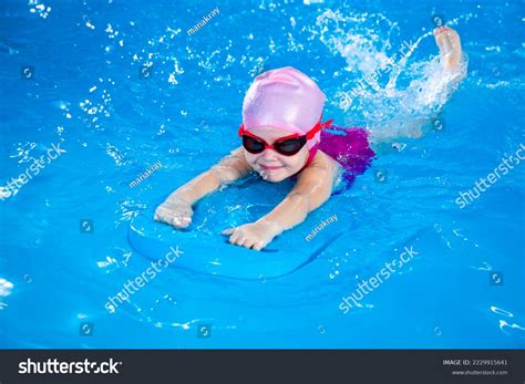 Preschool Cute Girl Learning Swim Indoor Stock Photo