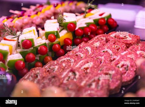 Different Assortment Of Meat For Grilling Row Beef Roll And Showcase