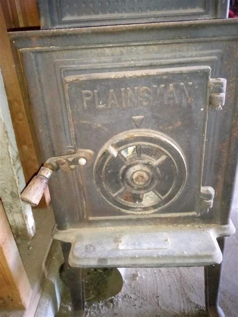 LOT 3 CAST IRON PLAINSMAN WOOD BURNING STOVE SDS EstateSales Org