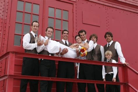 Bride And Groom With Groomsmen At Holland Lighthouse