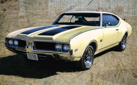 69 Oldsmobile 442 Photograph By Victor Montgomery