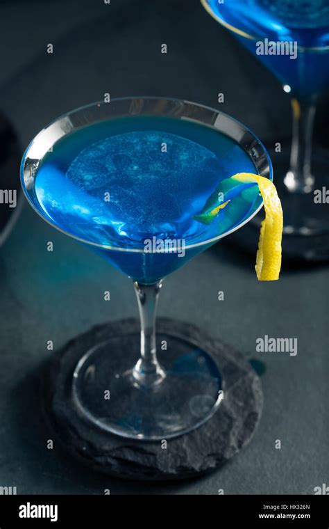 Refreshing Blue Martini Cocktail With Lemon Garnish Stock Photo Alamy