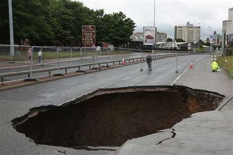 Manchester Sinkhole Becomes Unlikely Tourist Attraction The