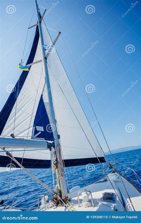 Sailing Ship Yachts With White Sails In The Open Sea Stock Image