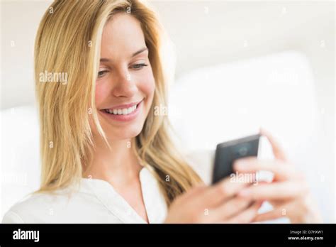 Blond Woman Texting Hi Res Stock Photography And Images Alamy