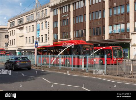 Plymouth Devon England Uk Red Buses On Royal Parade In The