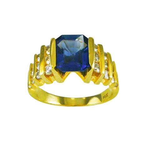 Emerald Cut Blue Sapphire And Diamond Ring