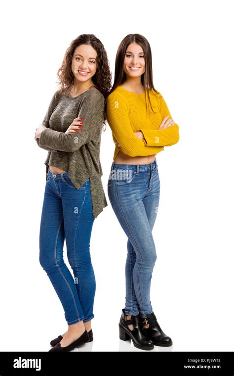 Studio Portrait Of Two Beautiful Girls Smiling Stock Photo Alamy