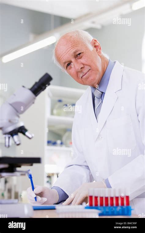 Male scientist doing research in laboratory, portrait Stock Photo - Alamy