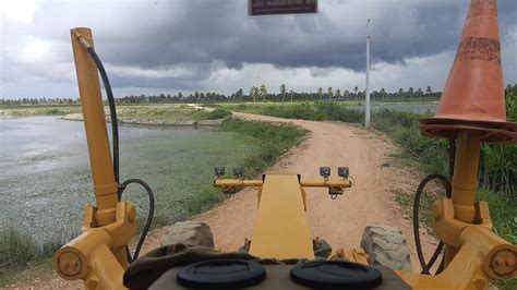 Estrada na parede de viveiro camarão limpeza básica motoniveladora