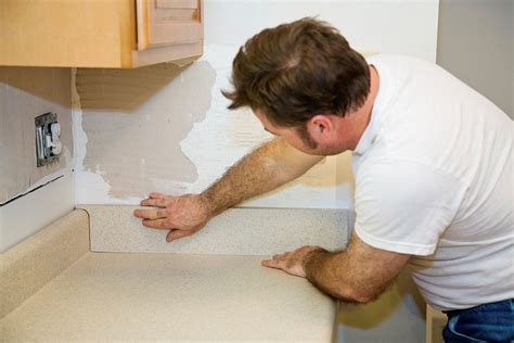 How To Caulk Countertop And Backsplash Storables