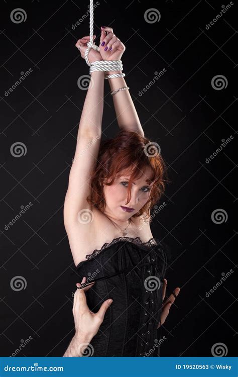 Red Woman In Corset Tied Up With Rope Stock Image Image 19520563