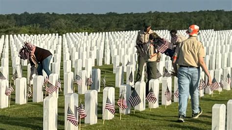 Fallen honored during Memorial Day flag placement at Barrancas National Cemetery