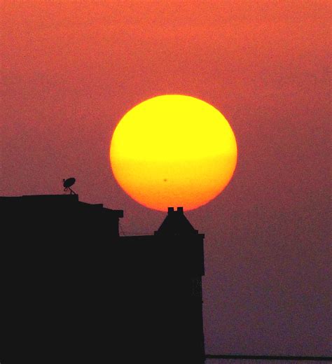 Photographing Sunset Against Tall Buildings Skypip