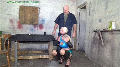Busty Blond MILF Taped Up Tight On The Girlie Go Round HD Kbps Hunters Lair Bondage