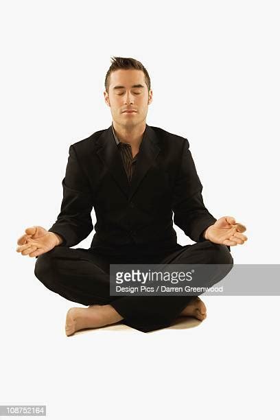 Man Sitting Cross Legged On Floor Eyes Closed Portrait Photos And