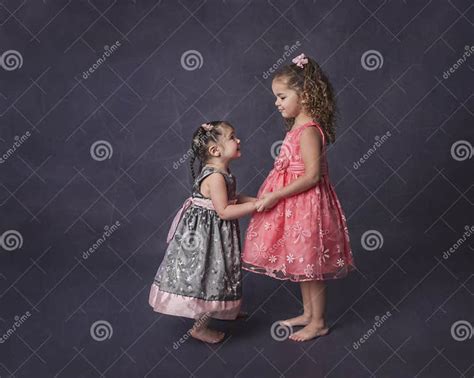 Sisters Holding Hands On Purple Background Stock Image Image Of