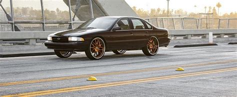 1996 Chevy Impala Ss On Gold 26s Doesnt Need The Big Lip Treatment To