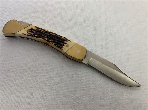 SCHRADE www.michigancustomknives.com