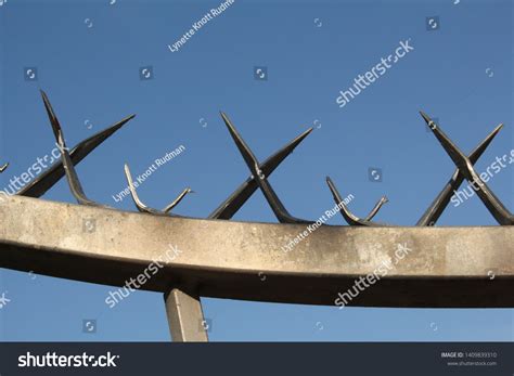 Burglar Climbing Over Fence Over 11 Royalty Free Licensable Stock