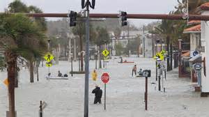 Flooding fills roads, threatens homes as Tropical Storm Nicole skirts