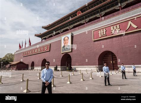 March Guards In Front Of A Giant Portrait Of Mao Tzedong On