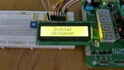 Digital Voltmeter Circuit Using 8051 Analog To Digital Converter