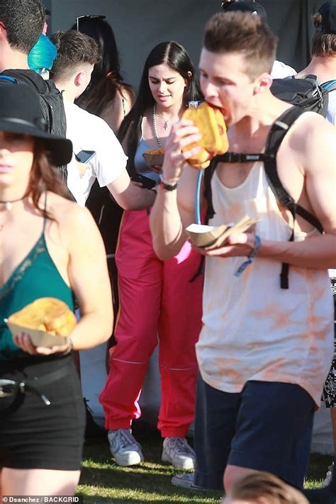 Ariel Winter Wears Crop Top And Pink Tracksuit Bottoms At Coachella