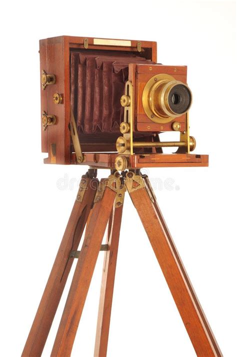 Vintage Wooden Camera On Tripod