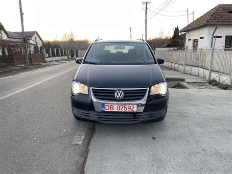 Vw Touran Tdi Trepte Locuri Clima Moreni Olx Ro